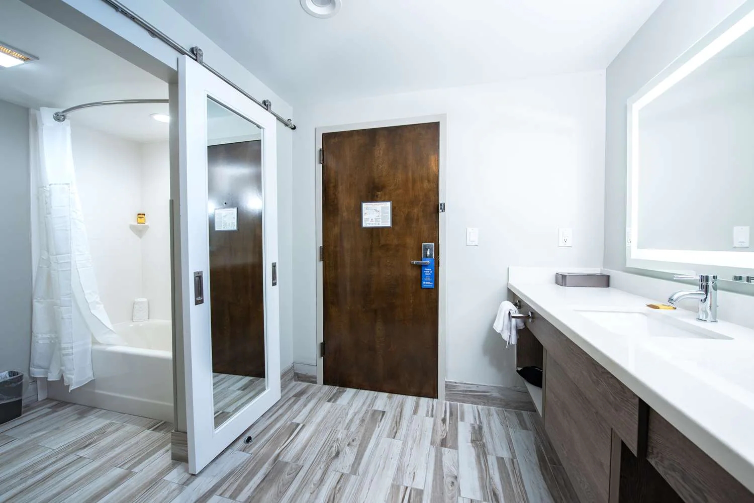 Guest room bathroom with modern vanity