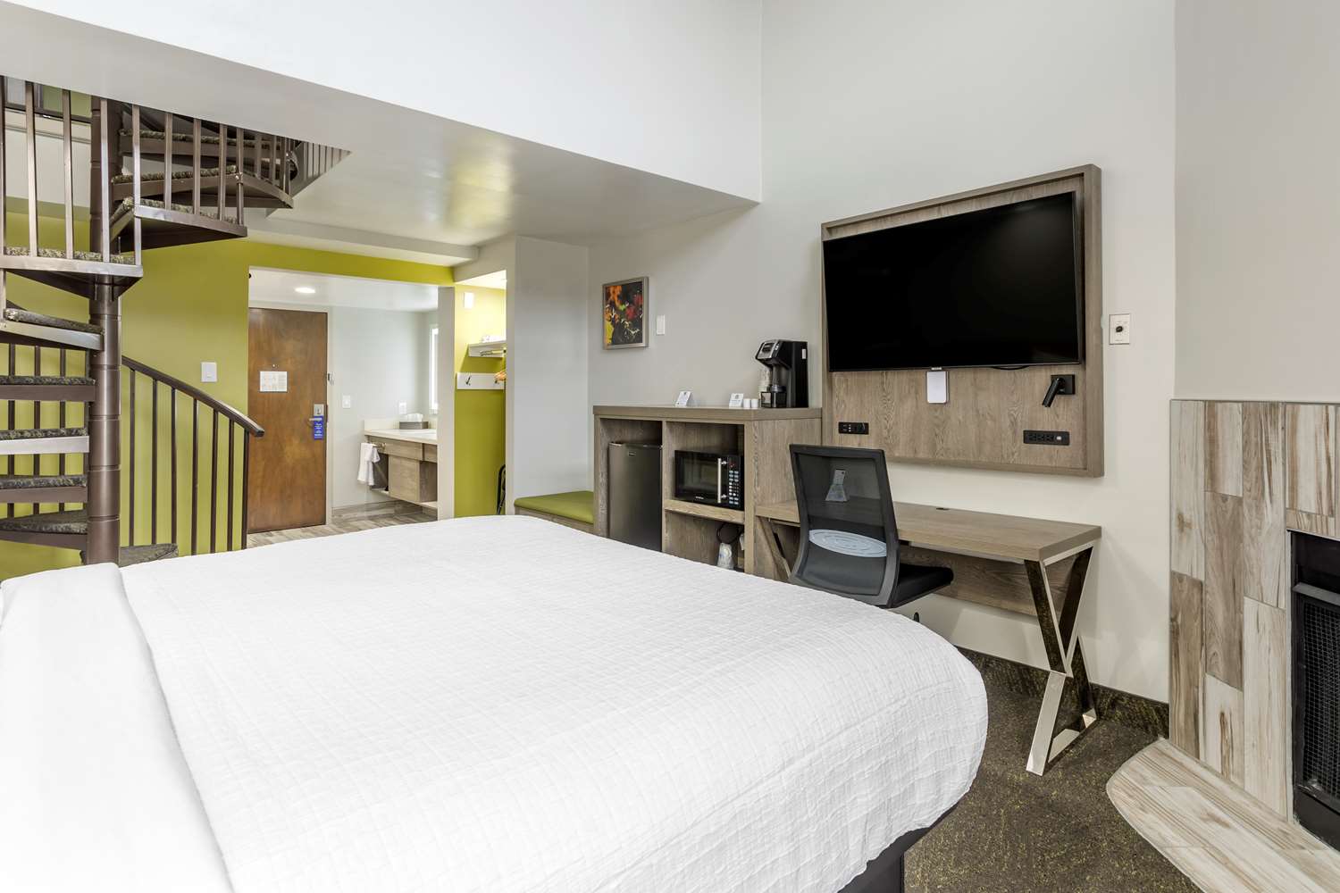 King Queen Loft Suite upper loft with queen bed